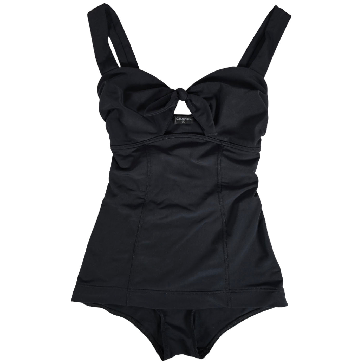 A Chanel black bathing suit with a black bow on the chest.