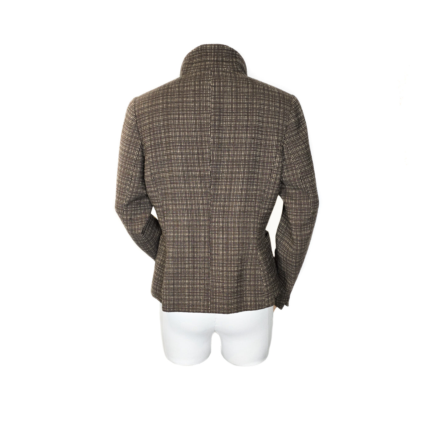 A brown checkered NATAN jacket on a mannequin, displaying a classic design suitable for both city and countryside wear.