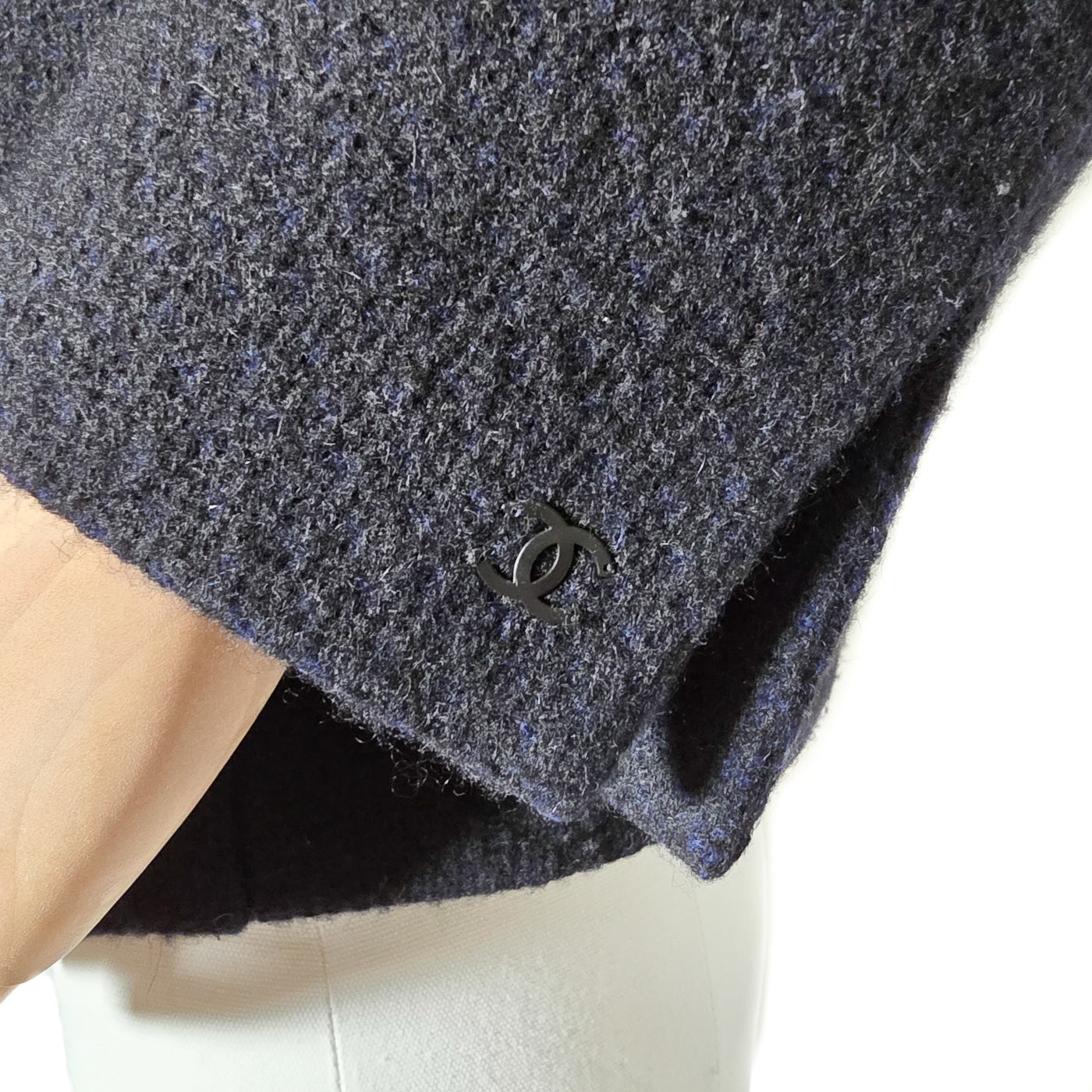 Vintage Chanel Cashmere Jacket in black and blue mixed cashmere blend with multiple front pockets, embossed zipper, and interlocking CC manchette detail.