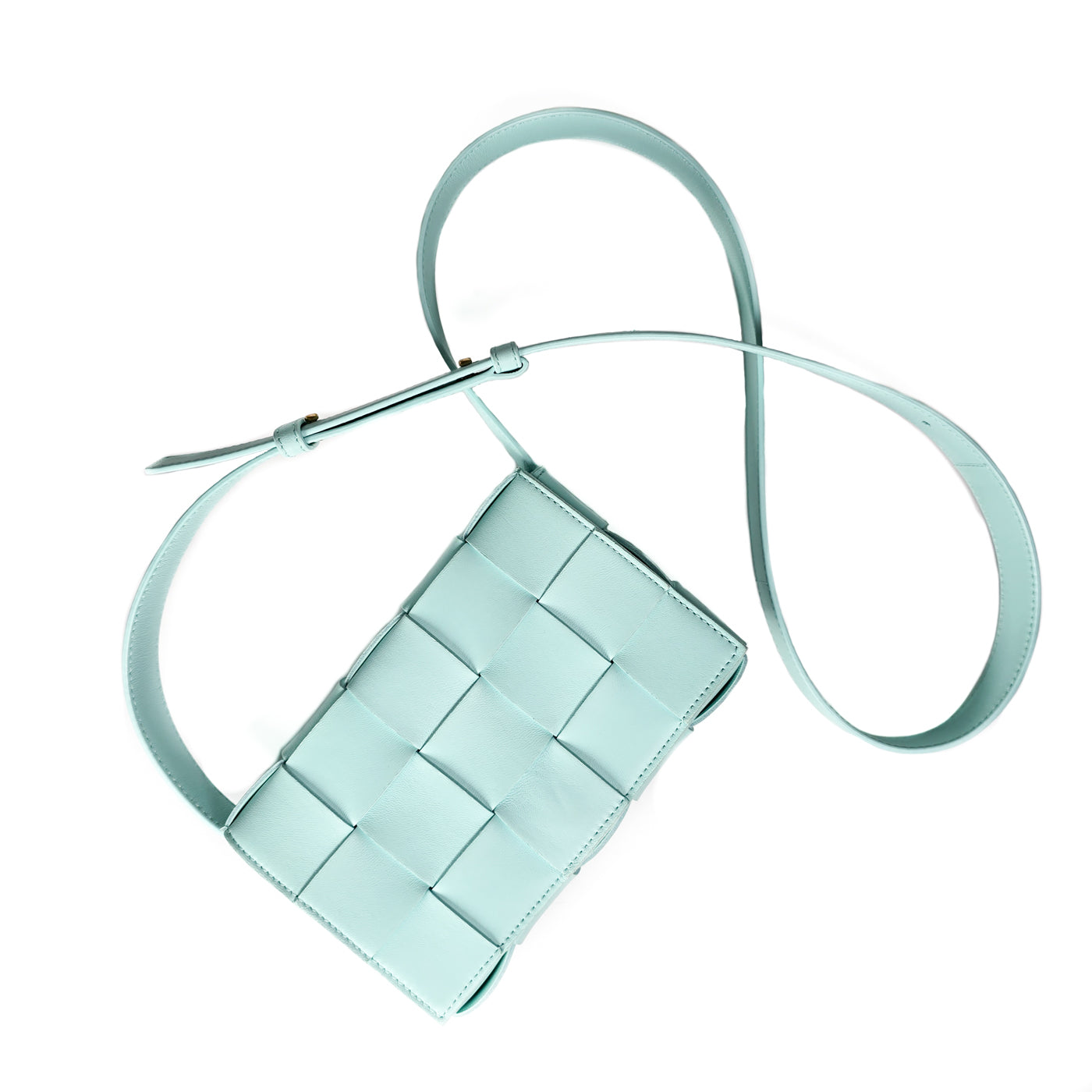 A Bottega Veneta lambskin leather crossbody bag in Tiffany blue with aged gold hardware accents, displayed against a white background.