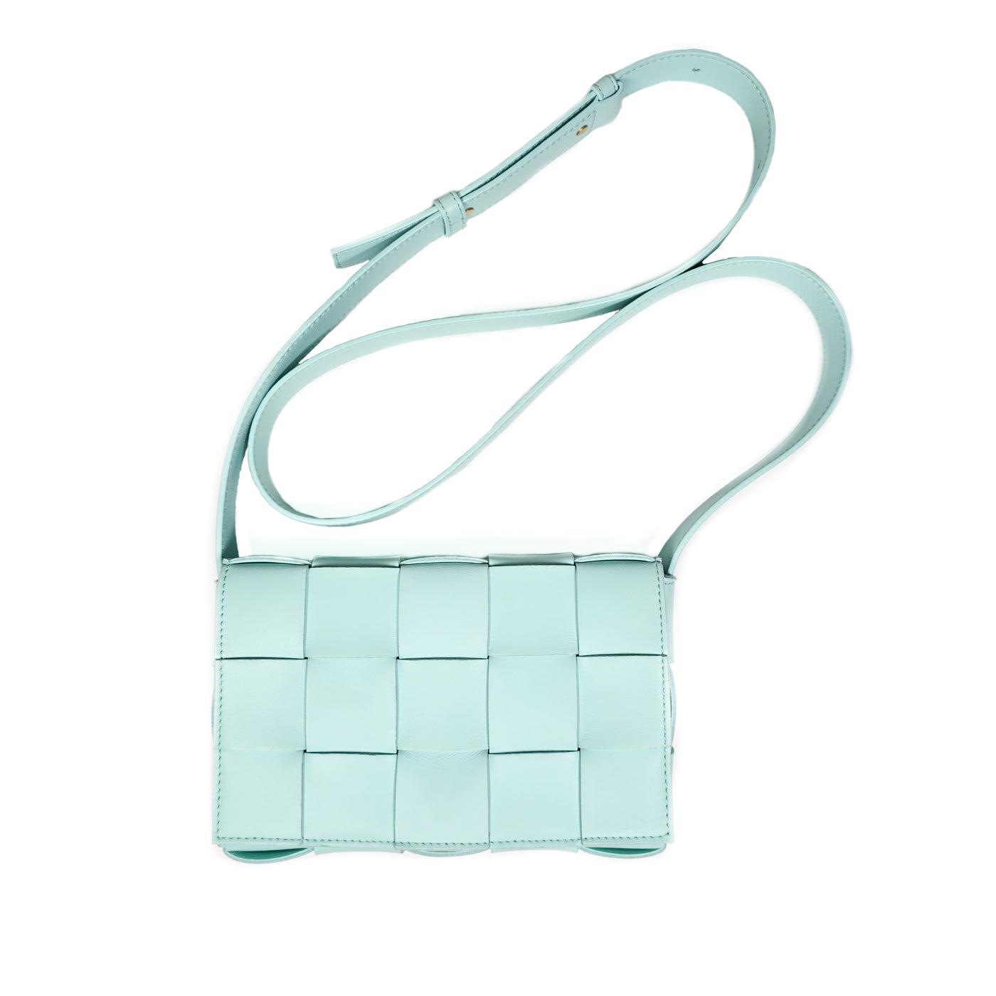A Bottega Veneta lambskin leather crossbody bag in Tiffany blue with aged gold hardware accents, displayed against a white background.