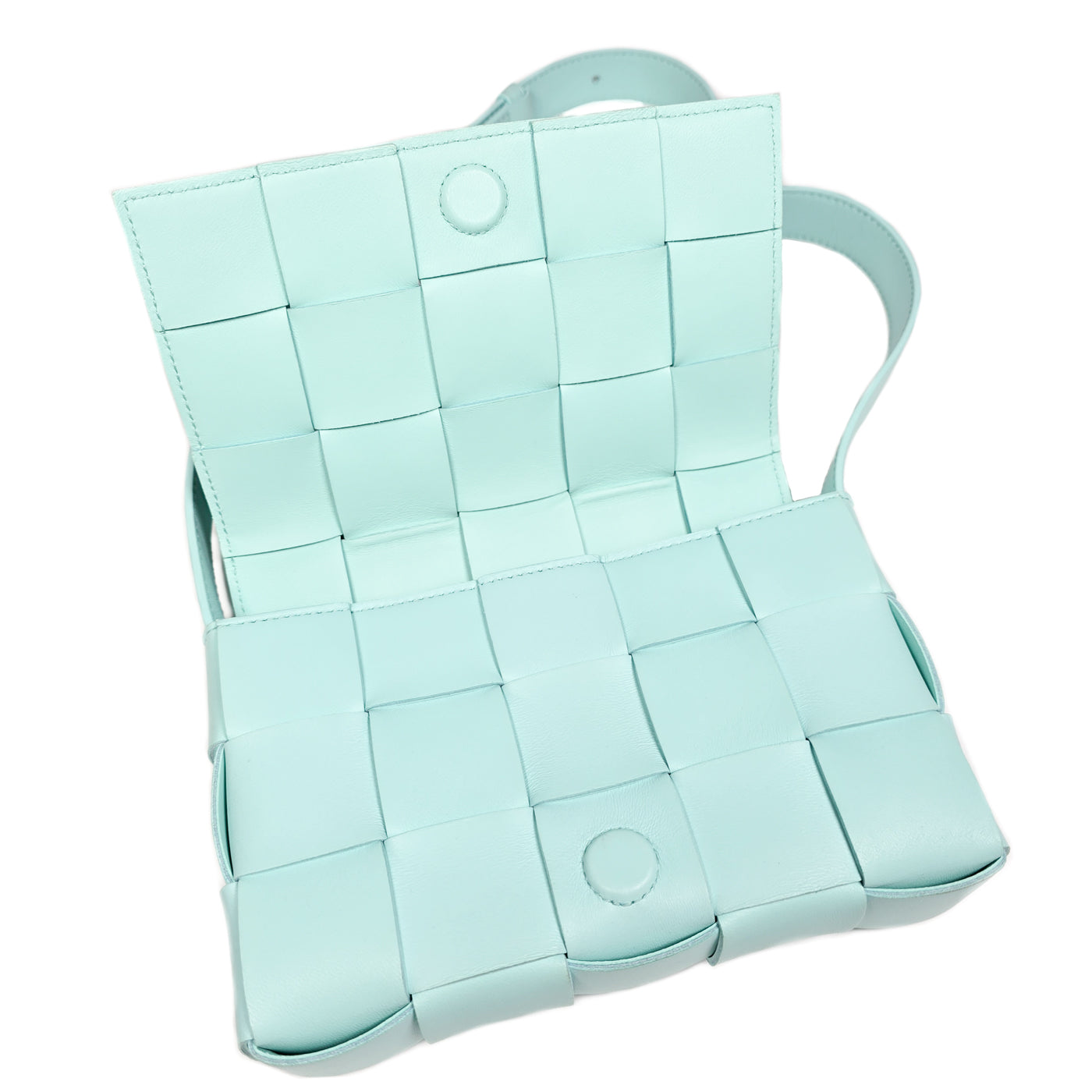A Bottega Veneta lambskin leather crossbody bag in Tiffany blue with aged gold hardware accents, displayed against a white background.