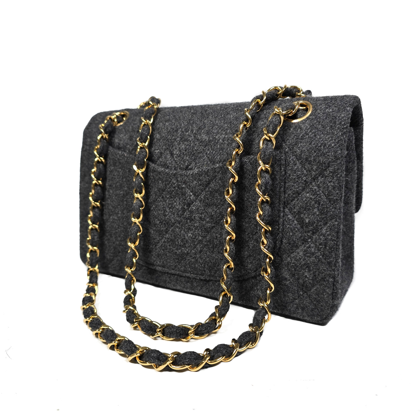 Chanel Vintage Grey Flannel Wool Double Flap Bag 24GHW Small 1990's
A Chanel vintage grey flannel wool double flap handbag with gold plated chain and turn-lock hardware.