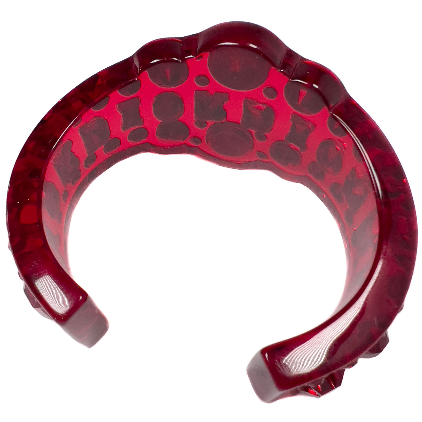 A pre-owned Dior Red Resin Crystal Cuff Bracelet, designed by John Galliano, featuring translucent resin and bright crystals in a deep ruby red.
