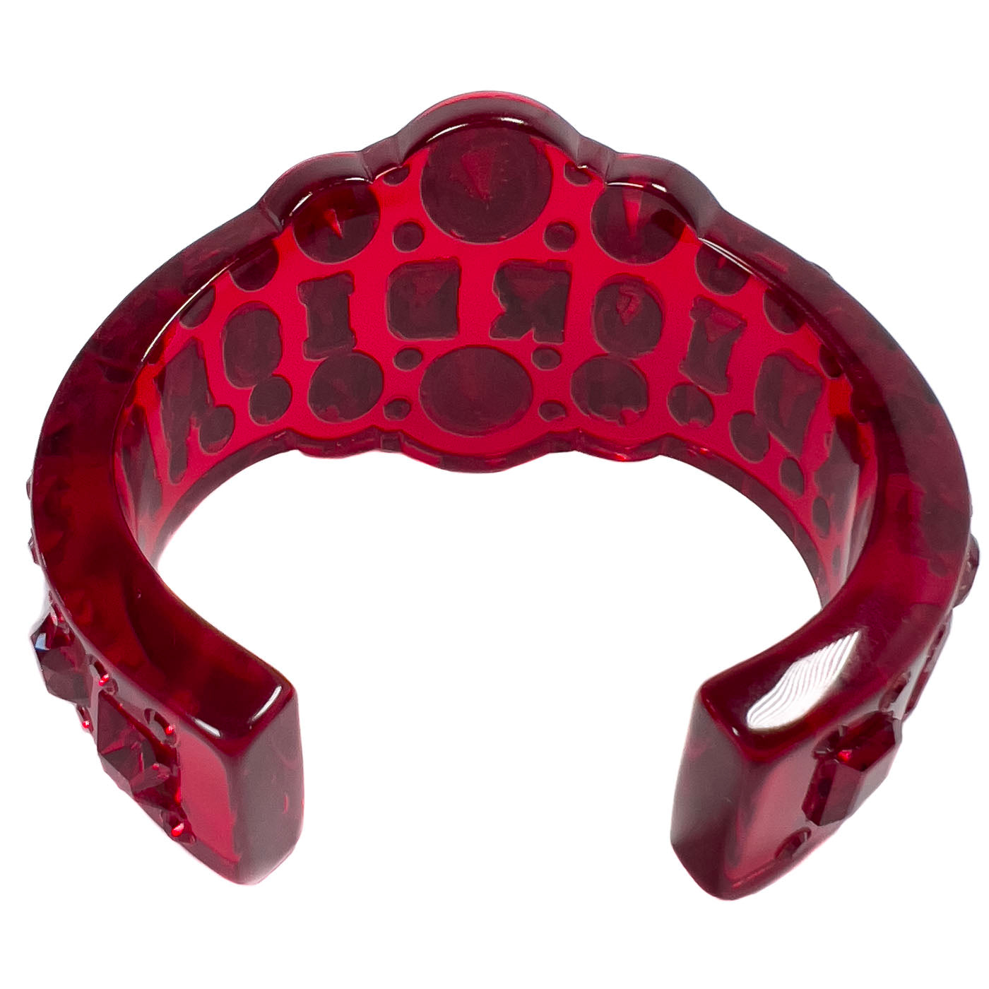 A pre-owned Dior Red Resin Crystal Cuff Bracelet, designed by John Galliano, featuring translucent resin and bright crystals in a deep ruby red.