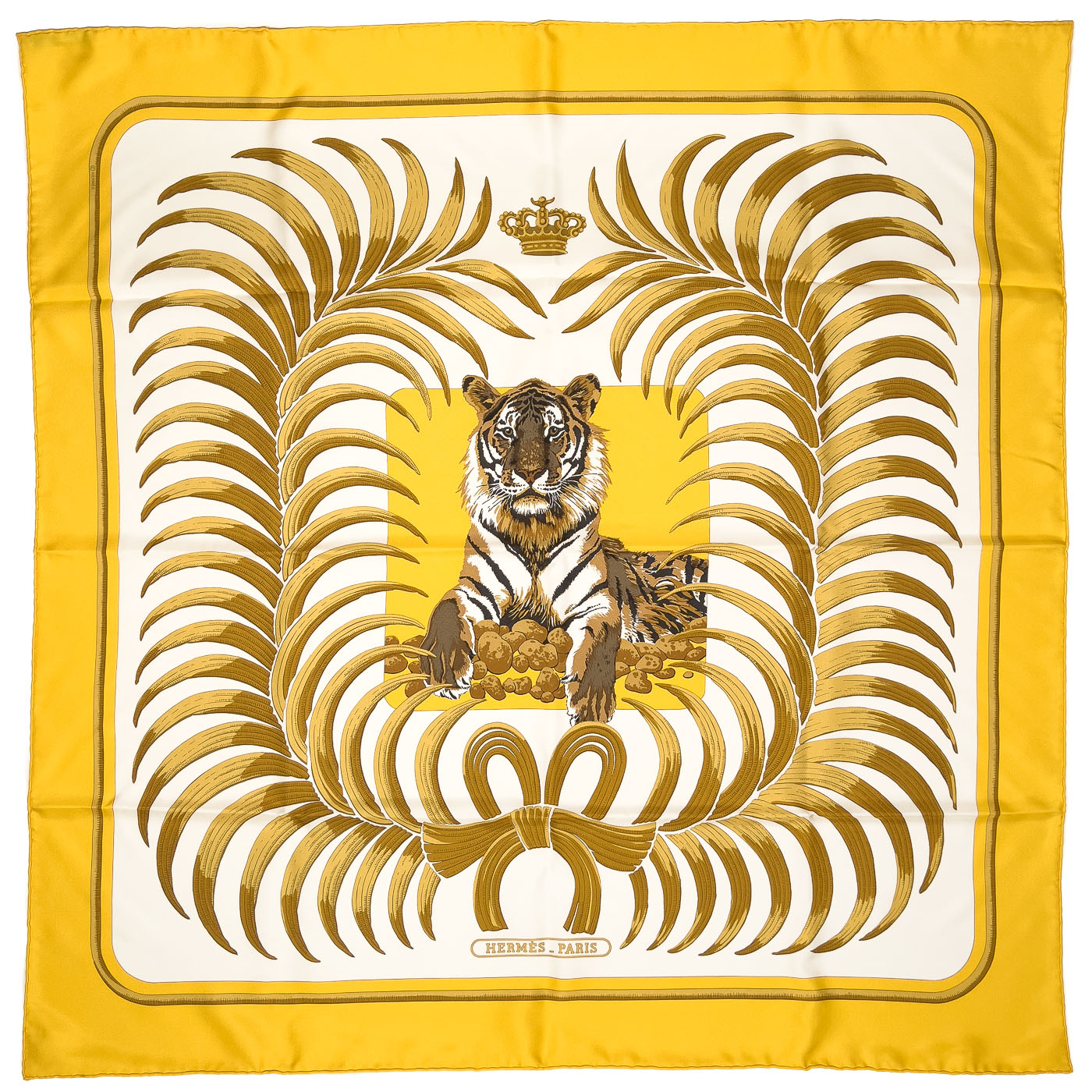 Vintage "Tigre Royal" by Christiane Vauzelles Hermès Carré 90 Scarf Yellow.
A vintage Hermès Carré 90 silk scarf featuring a yellow background with a depiction of a tiger, surrounded by golden palm leaves.