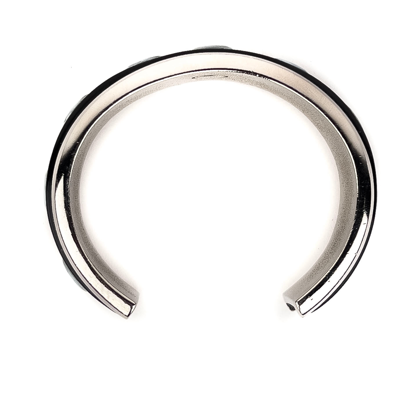 A vintage Chanel Mother of Pearl CC Cuff bracelet in silver tone with black lacquer and mother of pearl pastille CC inlays.