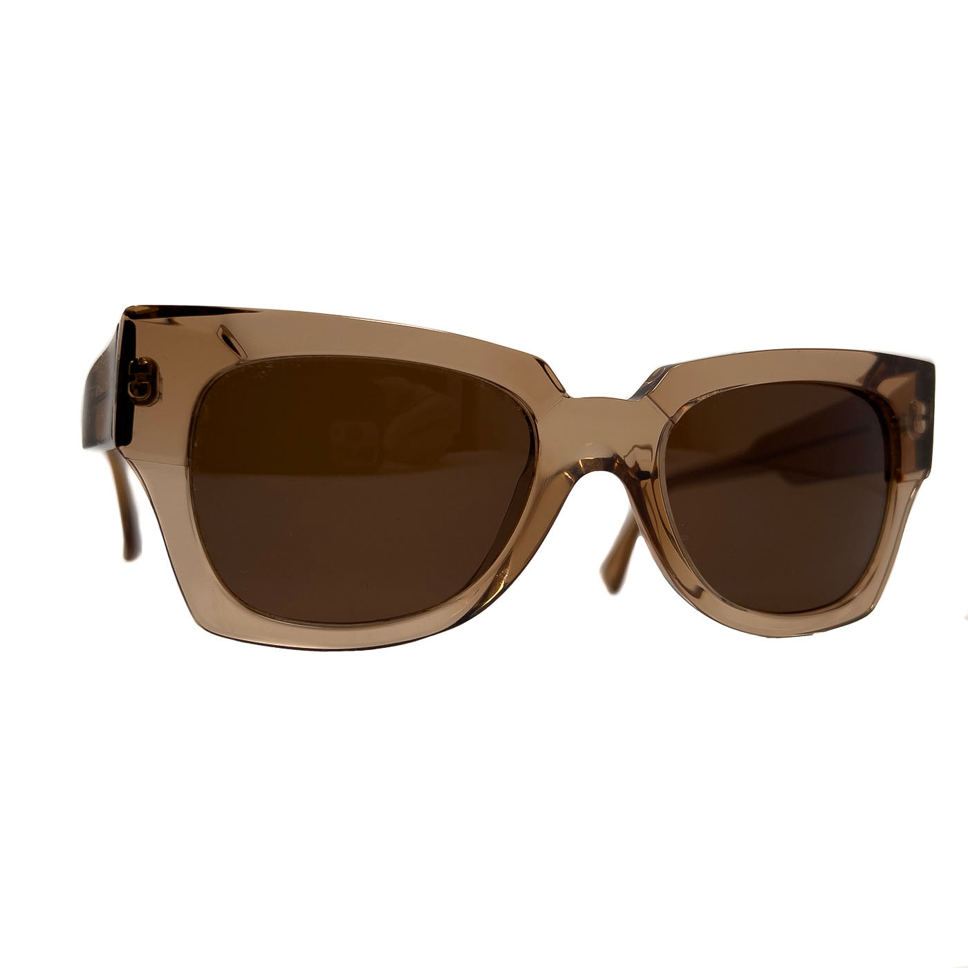 A pair of pre-owned Marni translucent brown acetate sunglasses with a distinctive shape, excellent lenses, and minimal signs of wear.