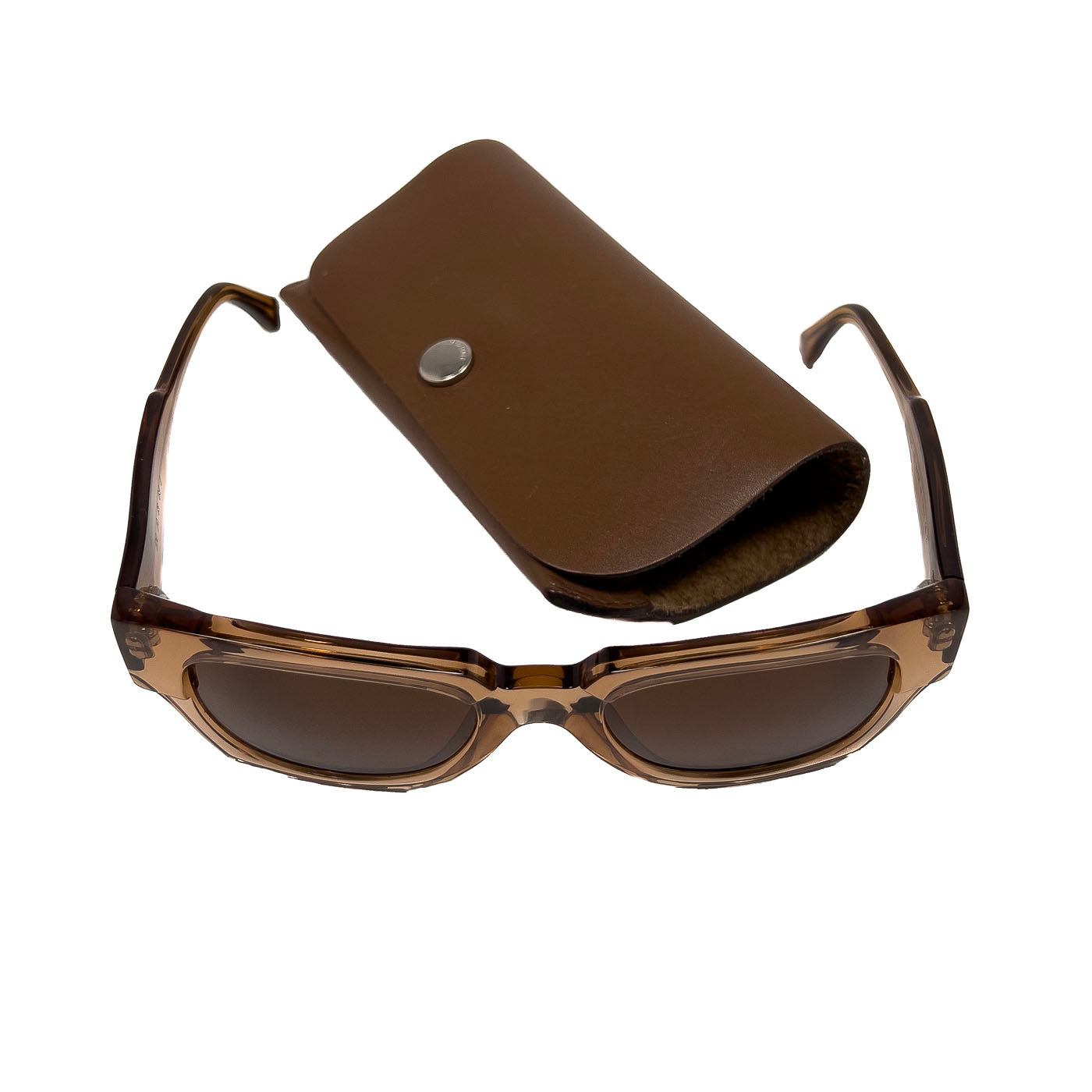 A pair of pre-owned Marni translucent brown acetate sunglasses with a distinctive shape, excellent lenses, and minimal signs of wear.