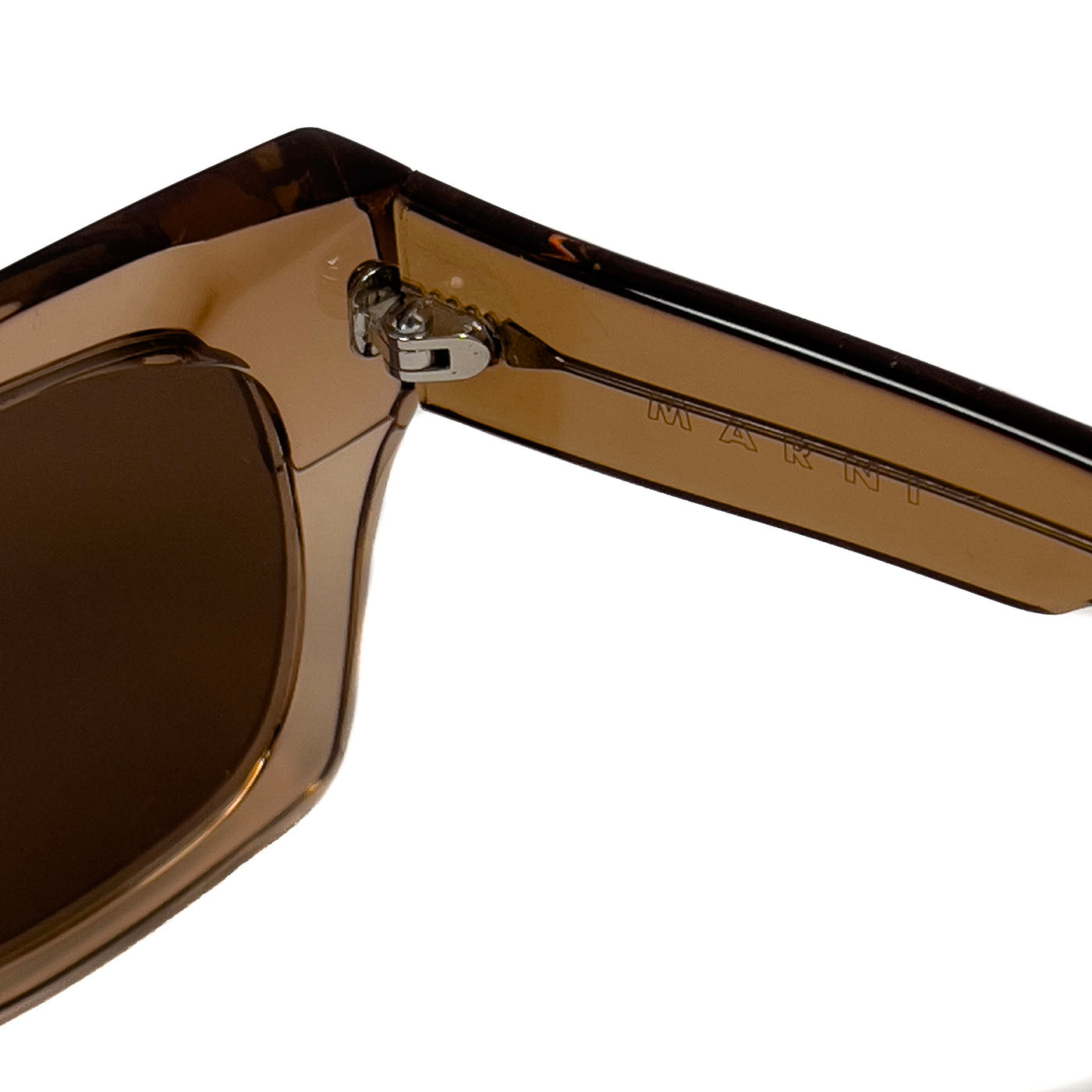 A pair of pre-owned Marni translucent brown acetate sunglasses with a distinctive shape, excellent lenses, and minimal signs of wear.