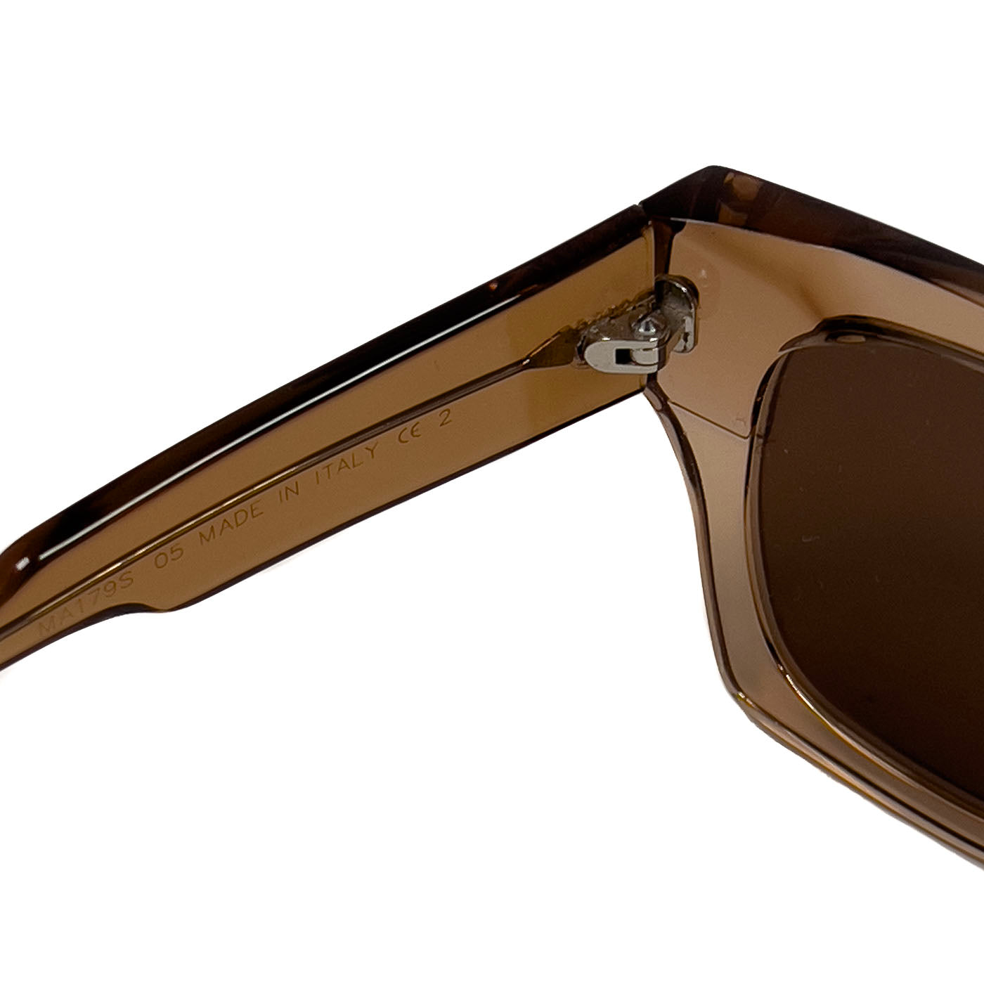 A pair of pre-owned Marni translucent brown acetate sunglasses with a distinctive shape, excellent lenses, and minimal signs of wear.