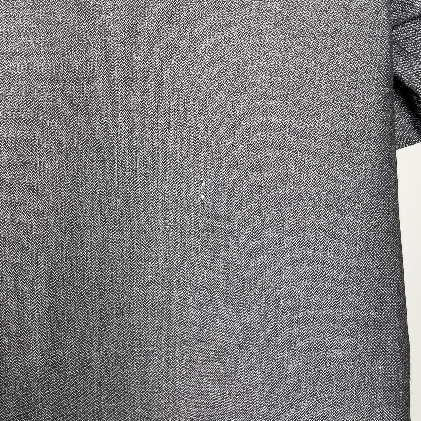 A Marni grey 3/4 sleeved coat with a calf leather belt, displayed on a mannequin with the belt detached and visible.