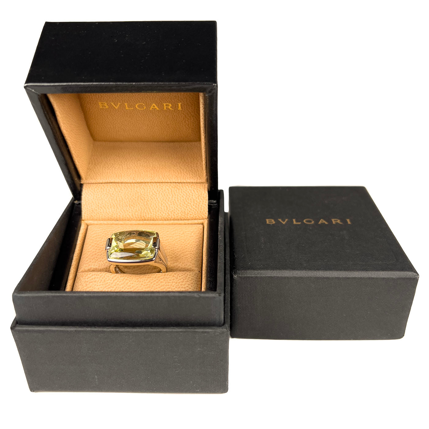 A vintage BVLGARI Metropolis ring in 18k white gold with a large citrine gemstone, displayed in its original box