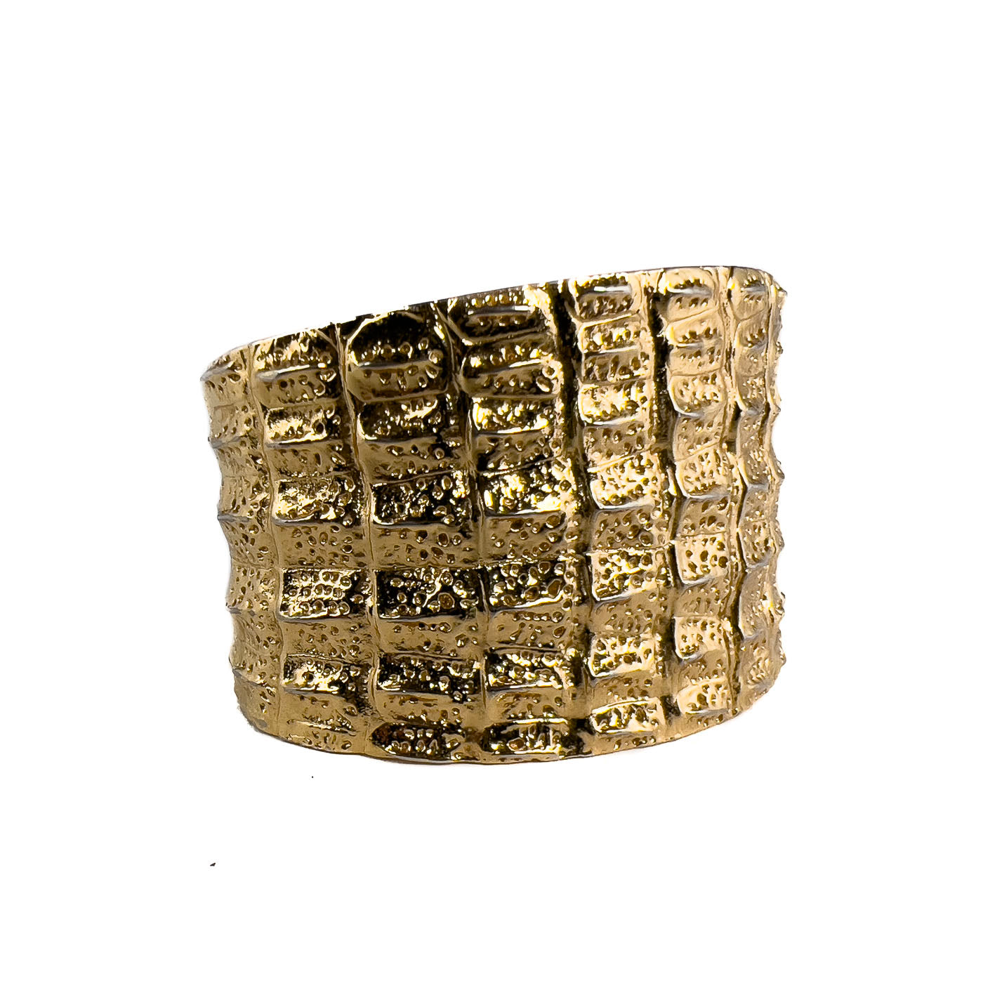 Vintage Yves Saint Laurent YSL Crocodile Pattern Cuff Bracelet Gold Tone. This beauty exemplifies the opulent style characteristic of Yves Saint Laurent. This line of jewelry was designed by Robert Goossens in 1986, as part of a collection honoring the 20th anniversary of Yves Saint Laurent. Pieces from this collection were prominently worn on screen by Penelope Cruz, in the movie Loving Pablo (2017).
