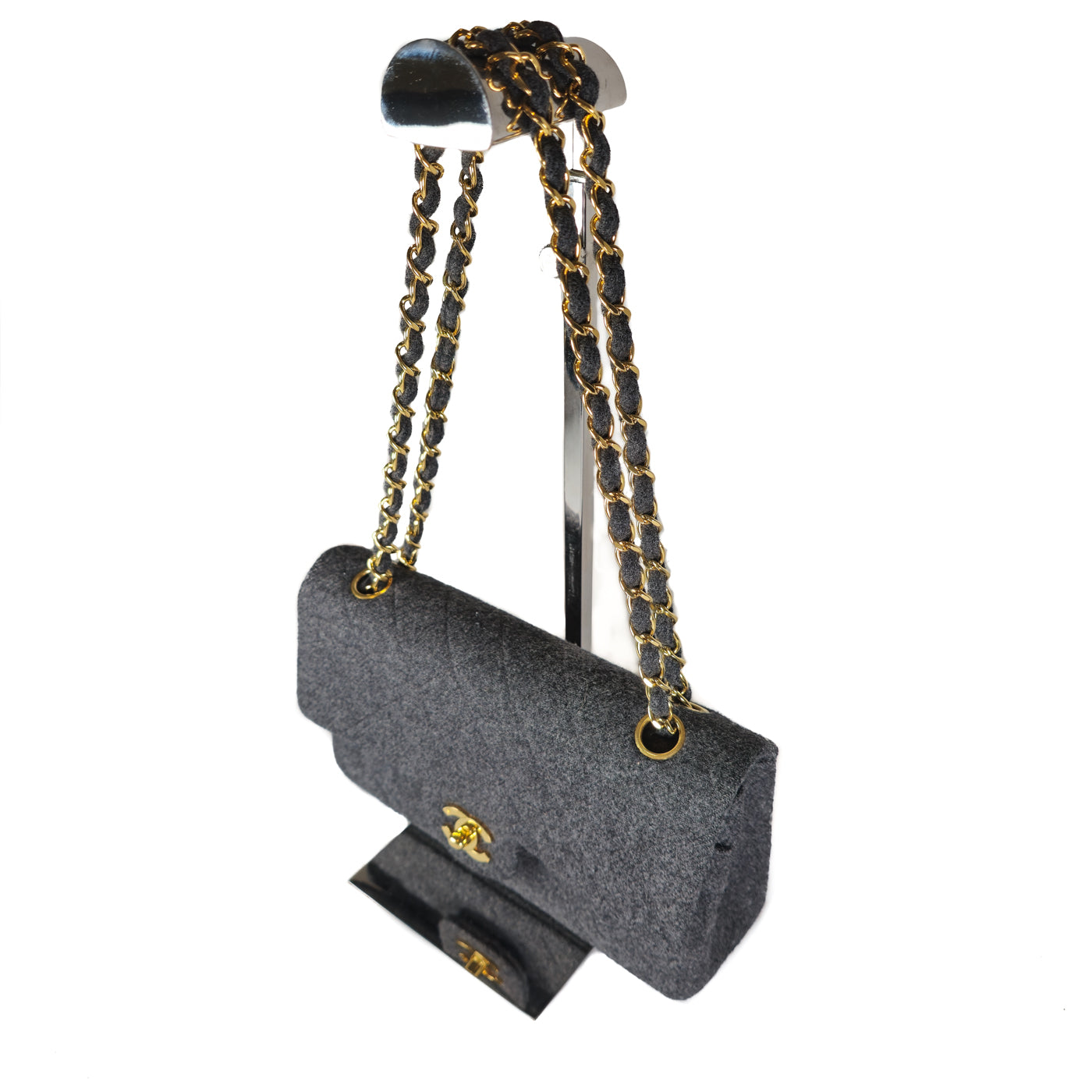 Chanel Vintage Grey Flannel Wool Double Flap Bag 24GHW Small 1990's

A Chanel vintage grey flannel wool double flap handbag with gold plated chain and turn-lock hardware.