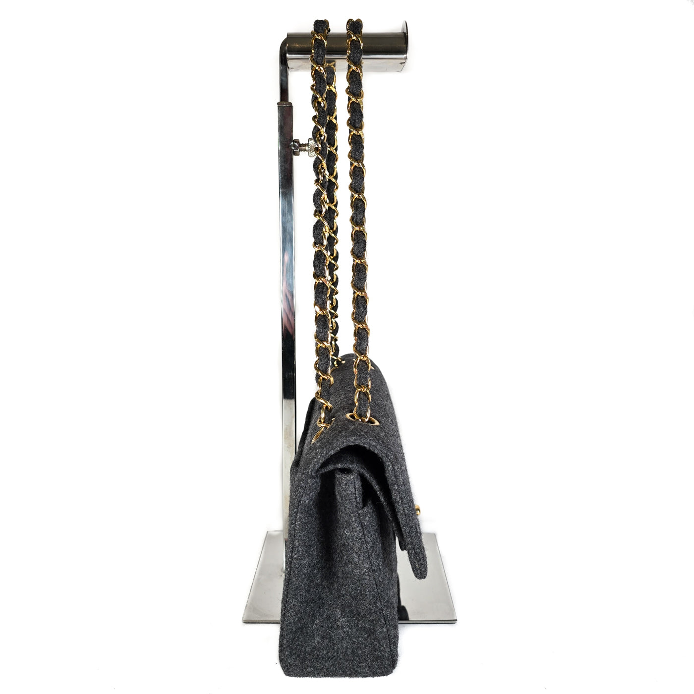 Chanel Vintage Grey Flannel Wool Double Flap Bag 24GHW Small 1990's

A Chanel vintage grey flannel wool double flap handbag with gold plated chain and turn-lock hardware.