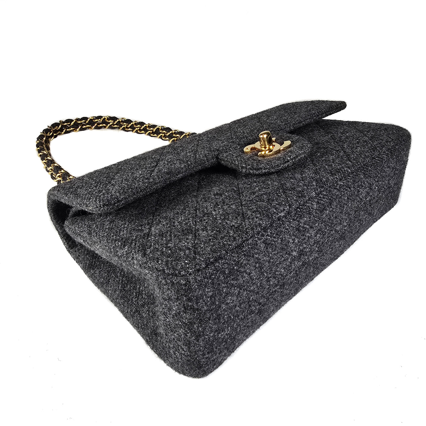 A Chanel vintage grey flannel wool double flap handbag with gold plated chain and turn-lock hardware.