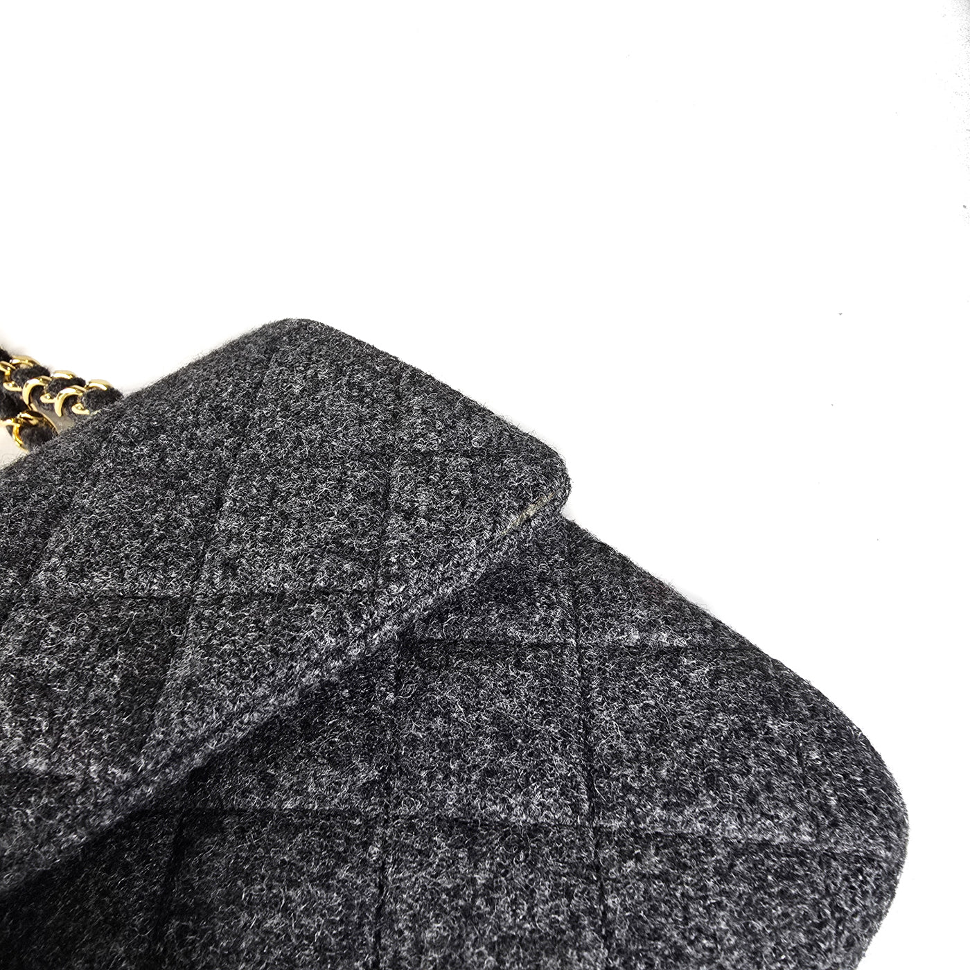 Chanel Vintage Grey Flannel Wool Double Flap Bag 24GHW Small 1990's

A Chanel vintage grey flannel wool double flap handbag with gold plated chain and turn-lock hardware.