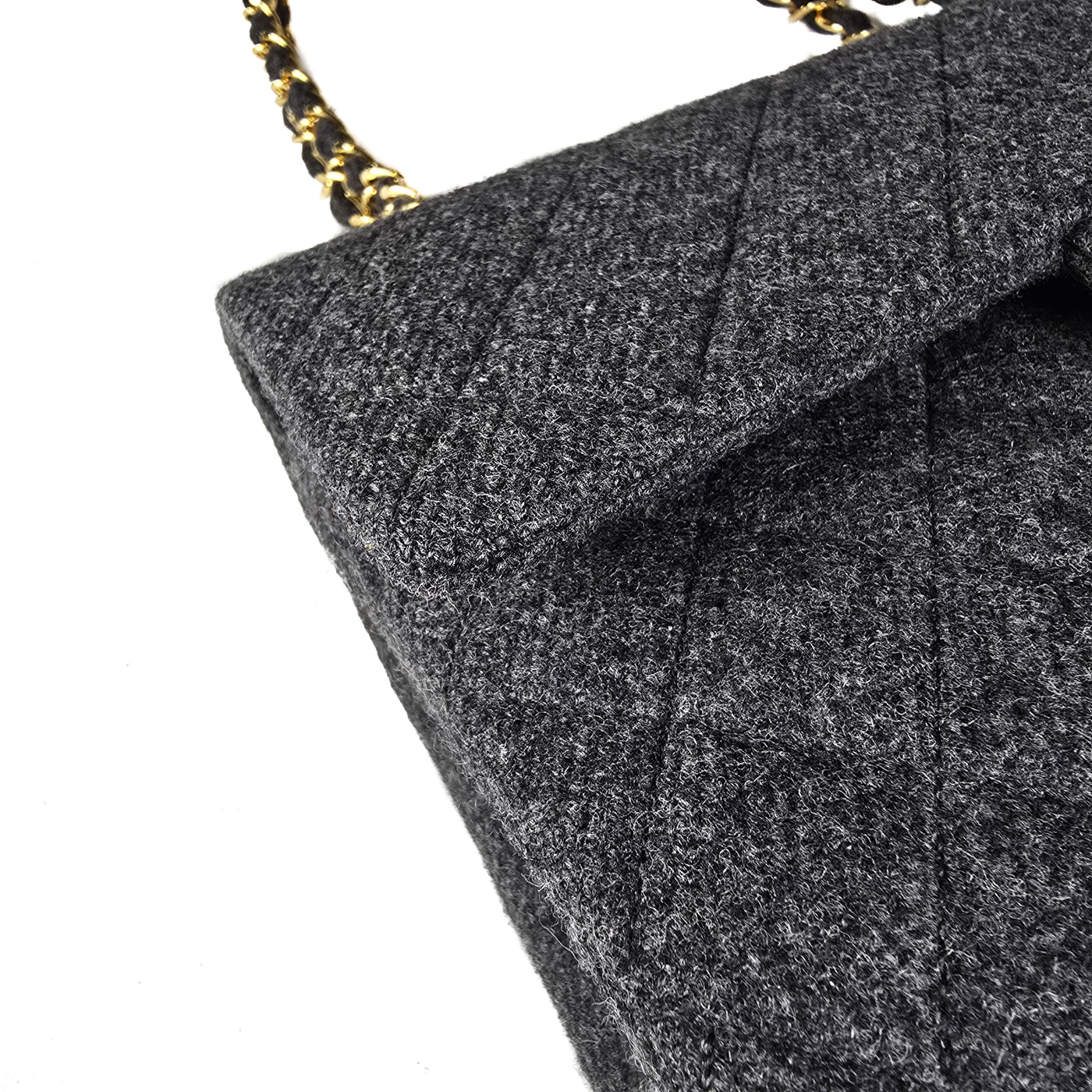 Chanel Vintage Grey Flannel Wool Double Flap Bag 24GHW Small 1990's

A Chanel vintage grey flannel wool double flap handbag with gold plated chain and turn-lock hardware.