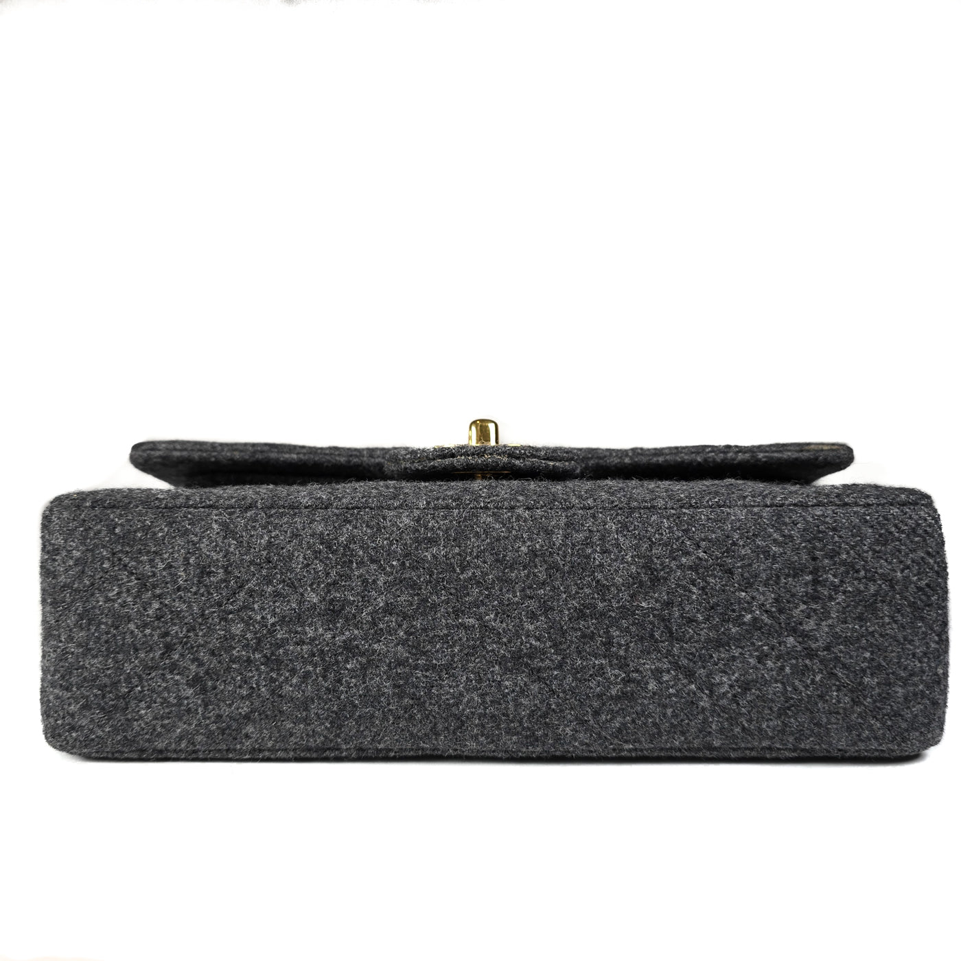 A Chanel vintage grey flannel wool double flap handbag with gold plated chain and turn-lock hardware.