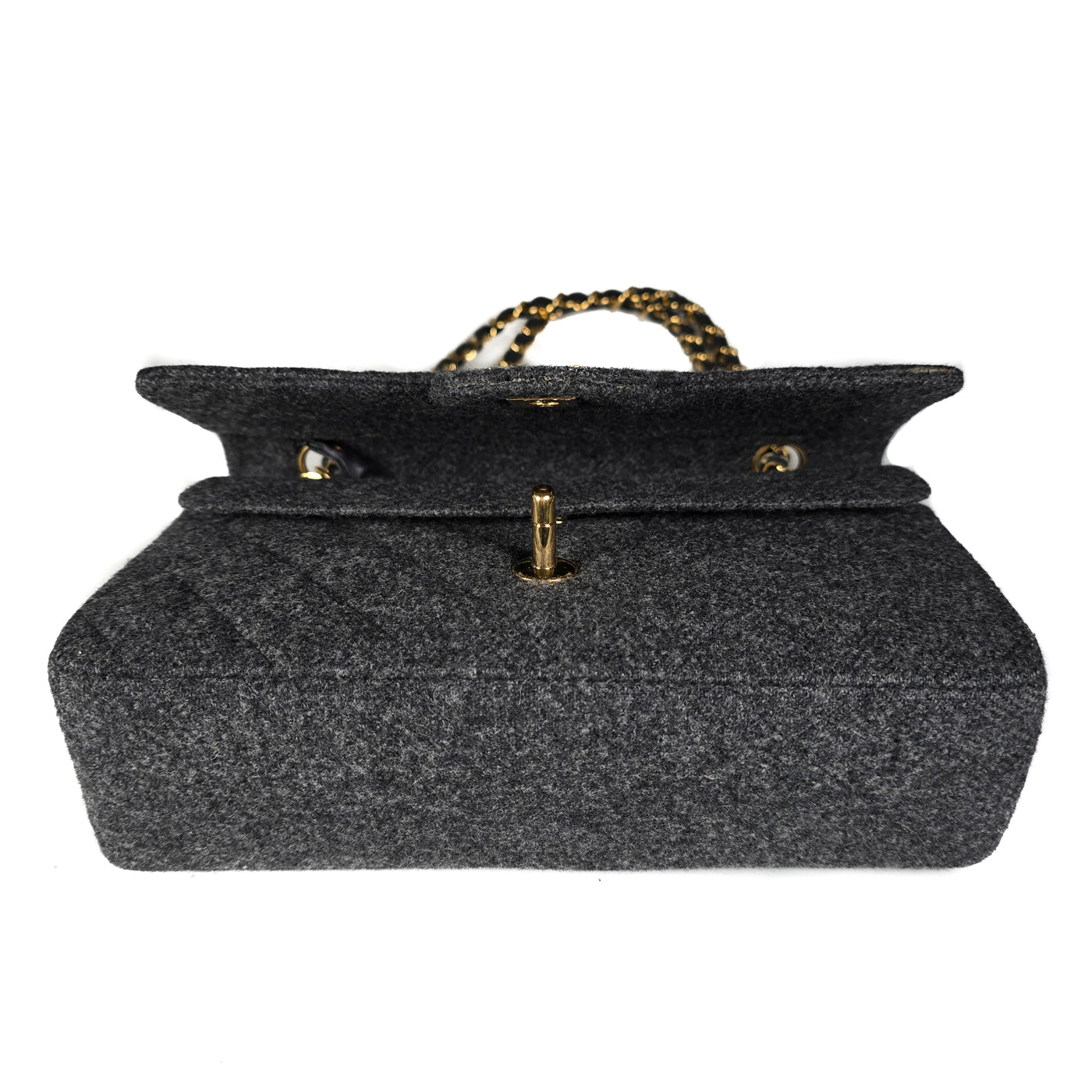 A Chanel vintage grey flannel wool double flap handbag with gold plated chain and turn-lock hardware.