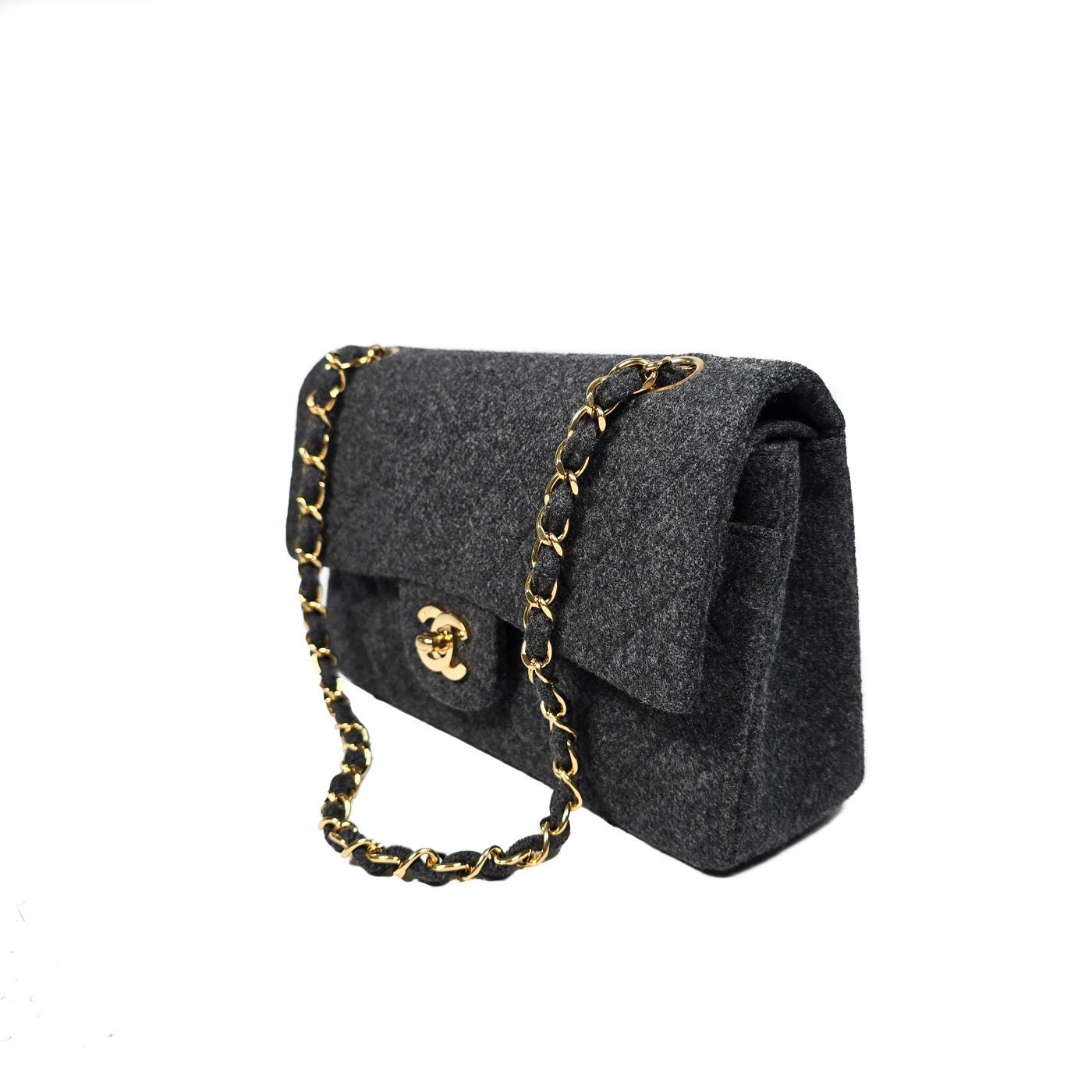 A Chanel vintage grey flannel wool double flap handbag with gold plated chain and turn-lock hardware.