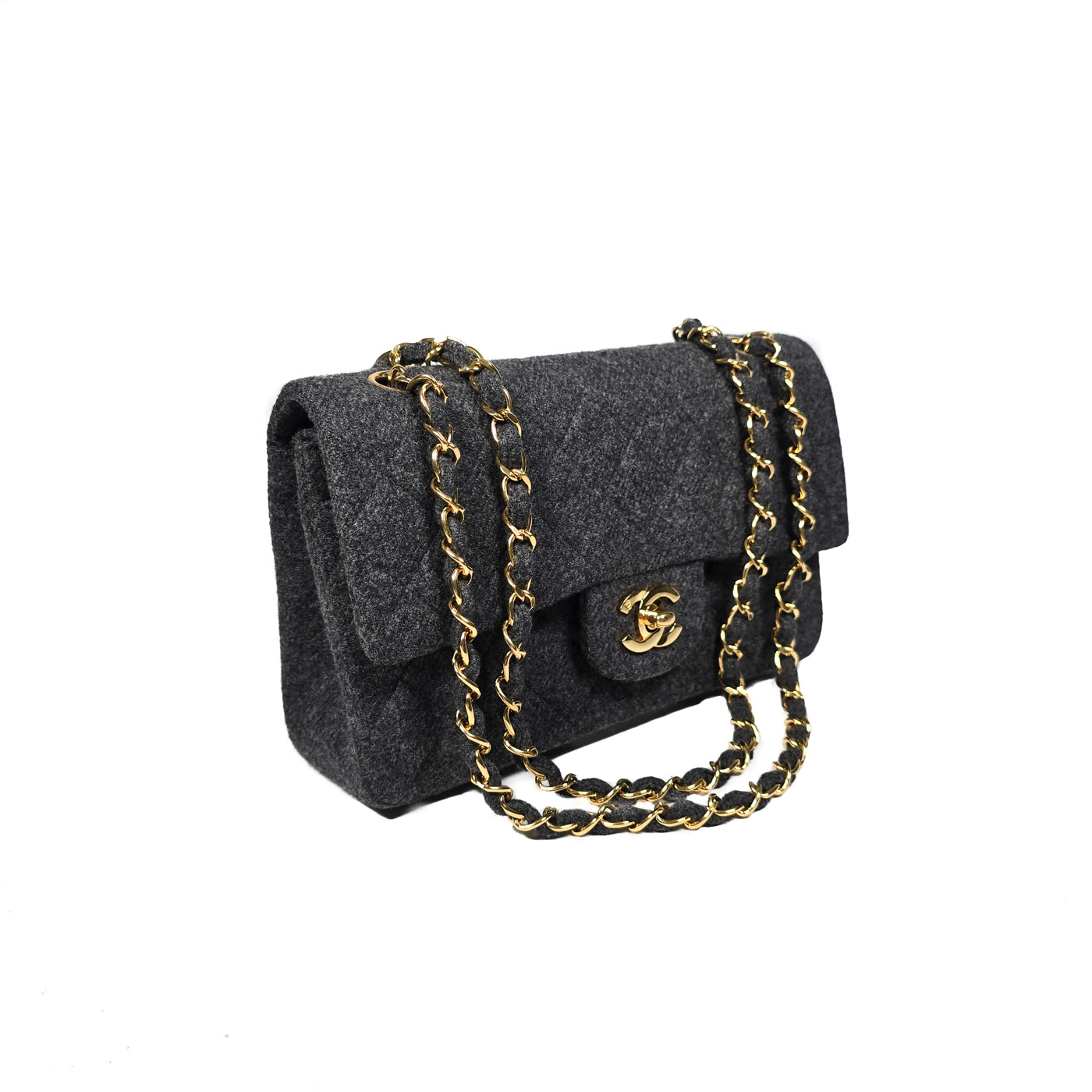 Chanel Vintage Grey Flannel Wool Double Flap Bag 24GHW Small 1990's.

A Chanel vintage grey flannel wool double flap handbag with gold plated chain and turn-lock hardware.