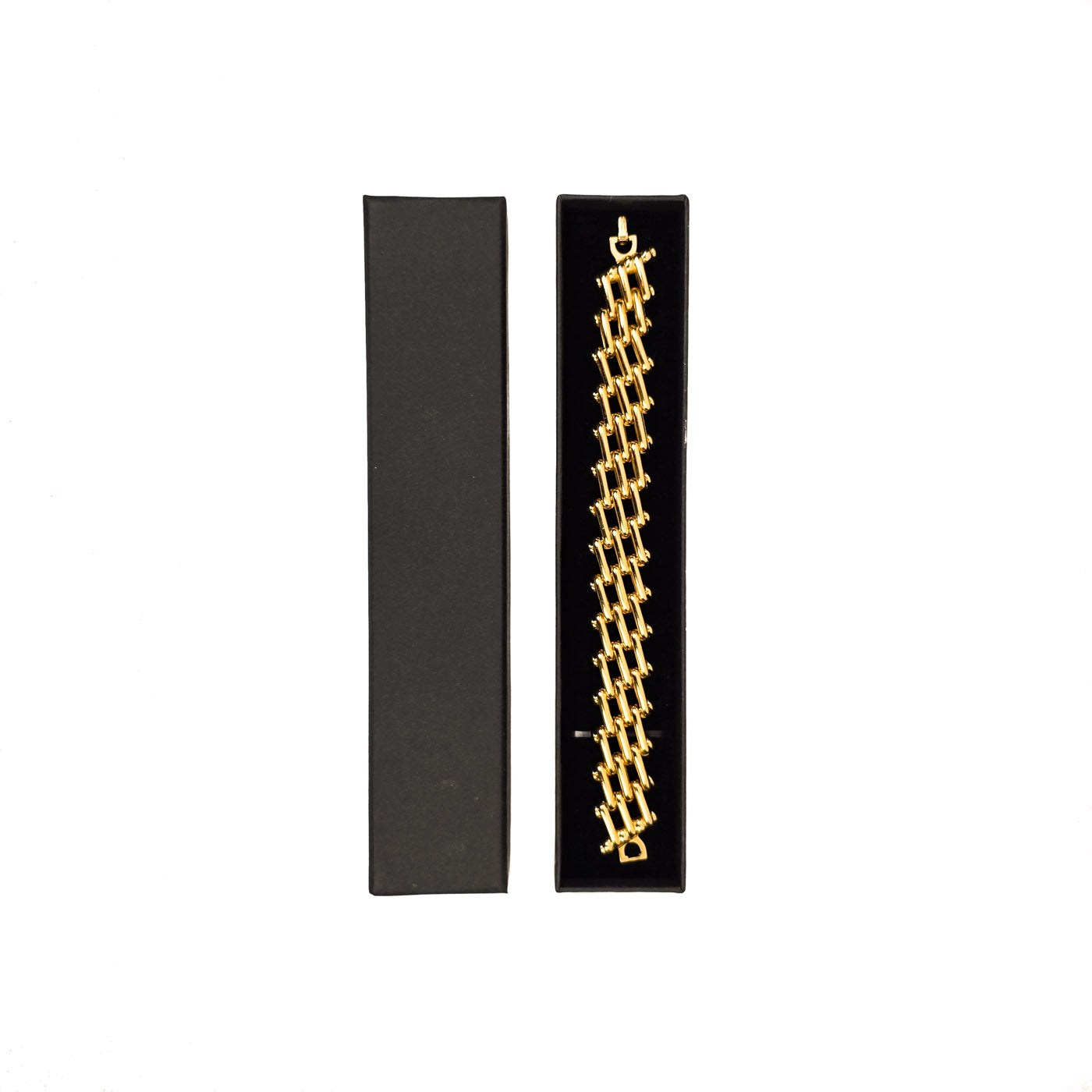 Golden Vintage Christian Dior bracelet in a black display box on a white background