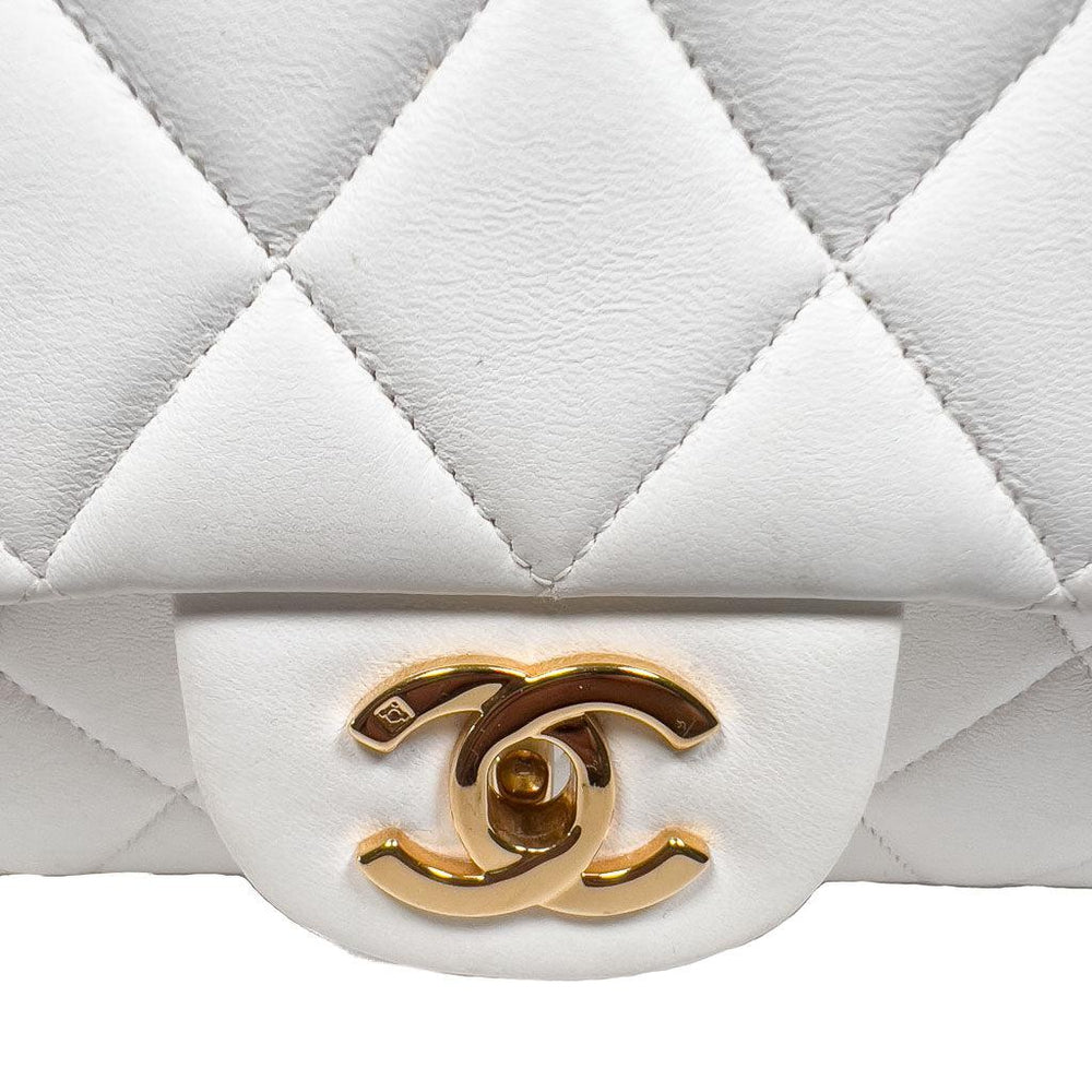 Chanel Vintage White Lambskin Leather Strap Small Classic Flap Bag 24k –  EYECATCHERSLUXE