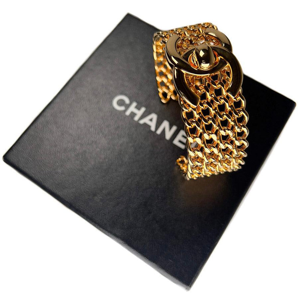 Vintage Chanel Bracelet CC Gold Turn Lock Cuff 97A – EYECATCHERSLUXE