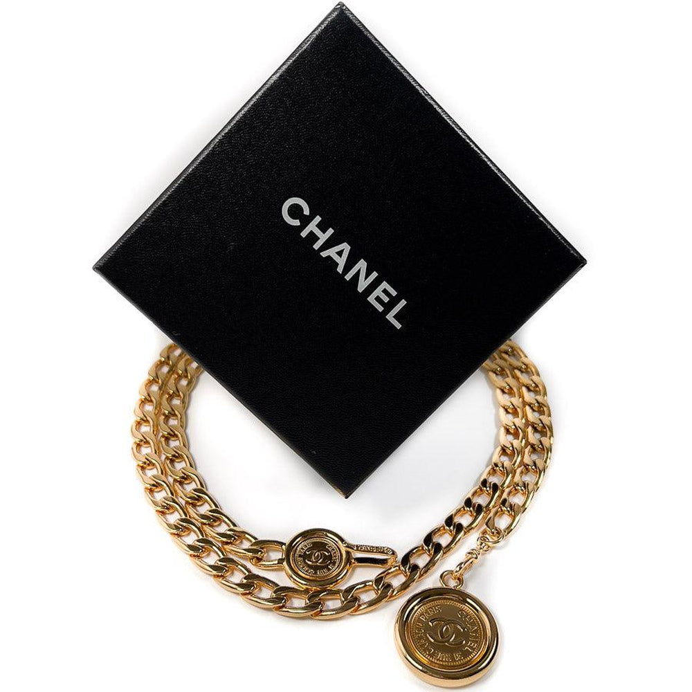 MINT. Vintage CHANEL golden thick chain belt with a CC charm and
