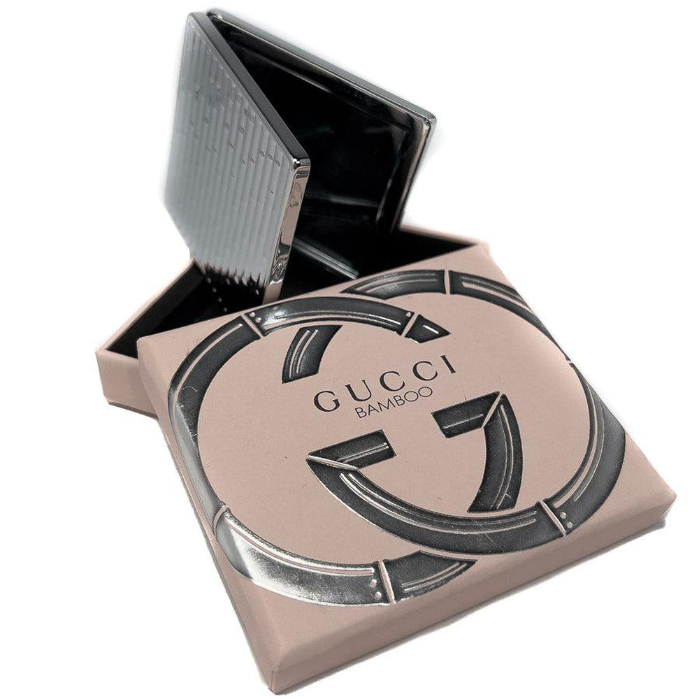 Promotional compact mirror as a GWP by Gucci